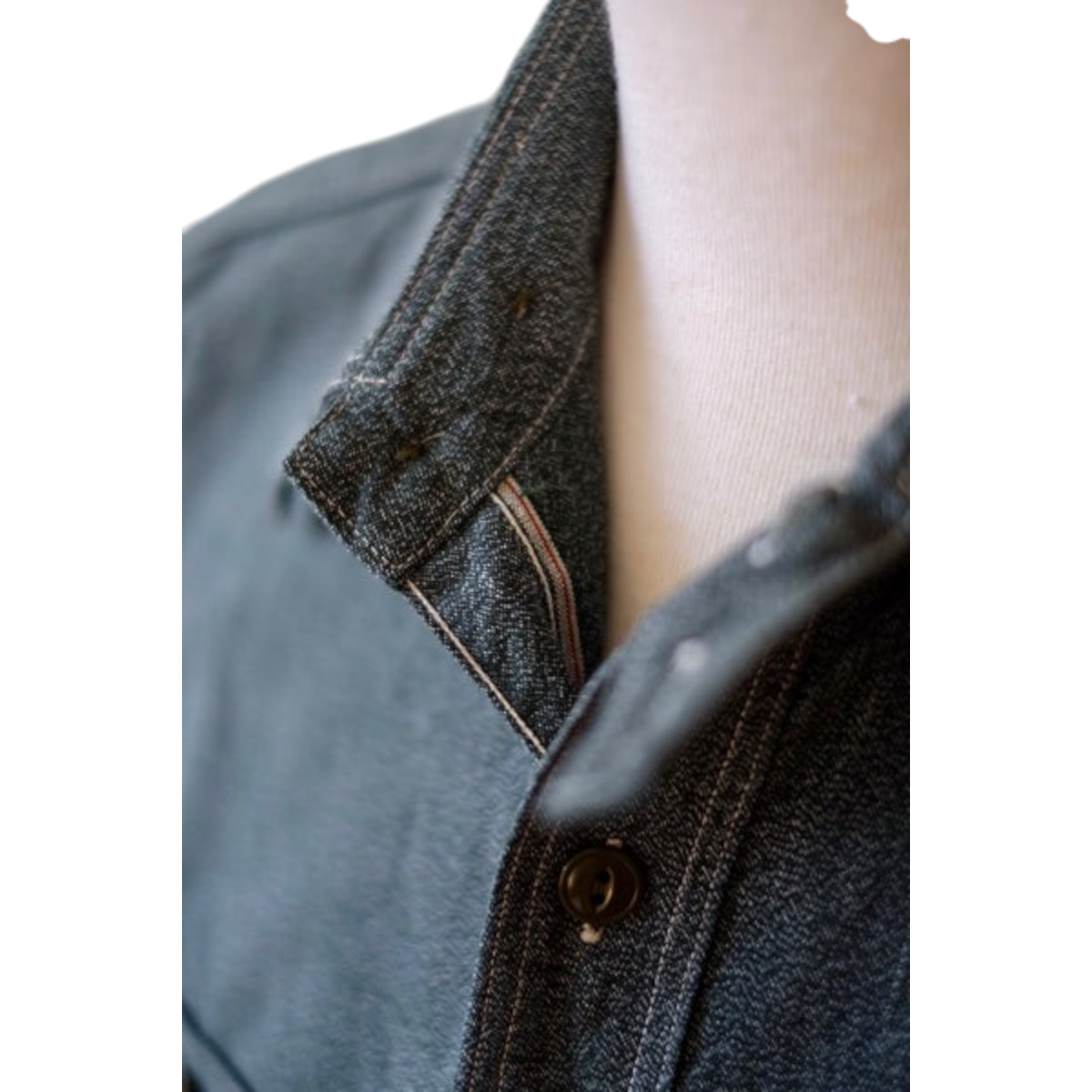 MILWORKS Atlas work shirt in sage green salt and pepper selvedge chambray featuring a chinstrap collar detail.