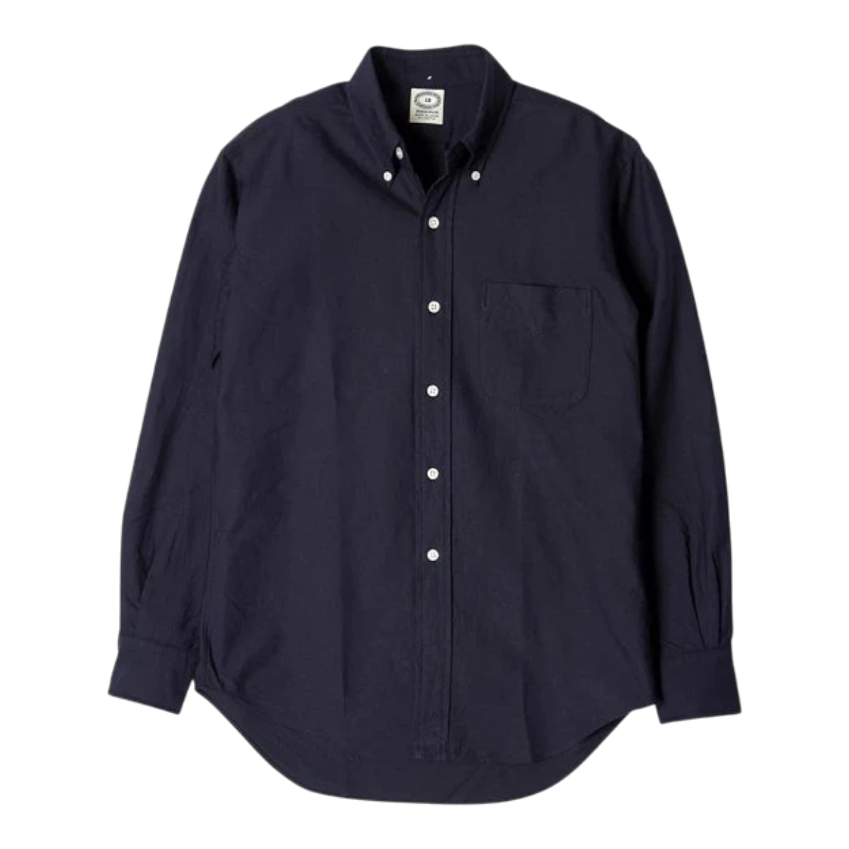 Kamakura navy blue cotton oxford button-down shirt with chest pocket and cream-colored shell buttons.