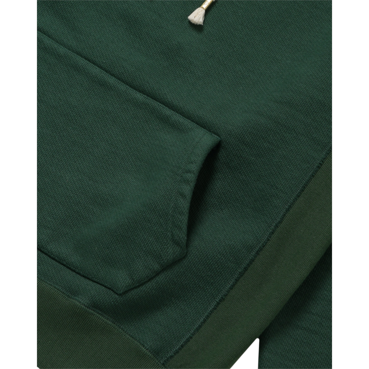 MILWORKS double heavyweight French terry pullover hoodie in racing green with a front pocket and drawstring detail.