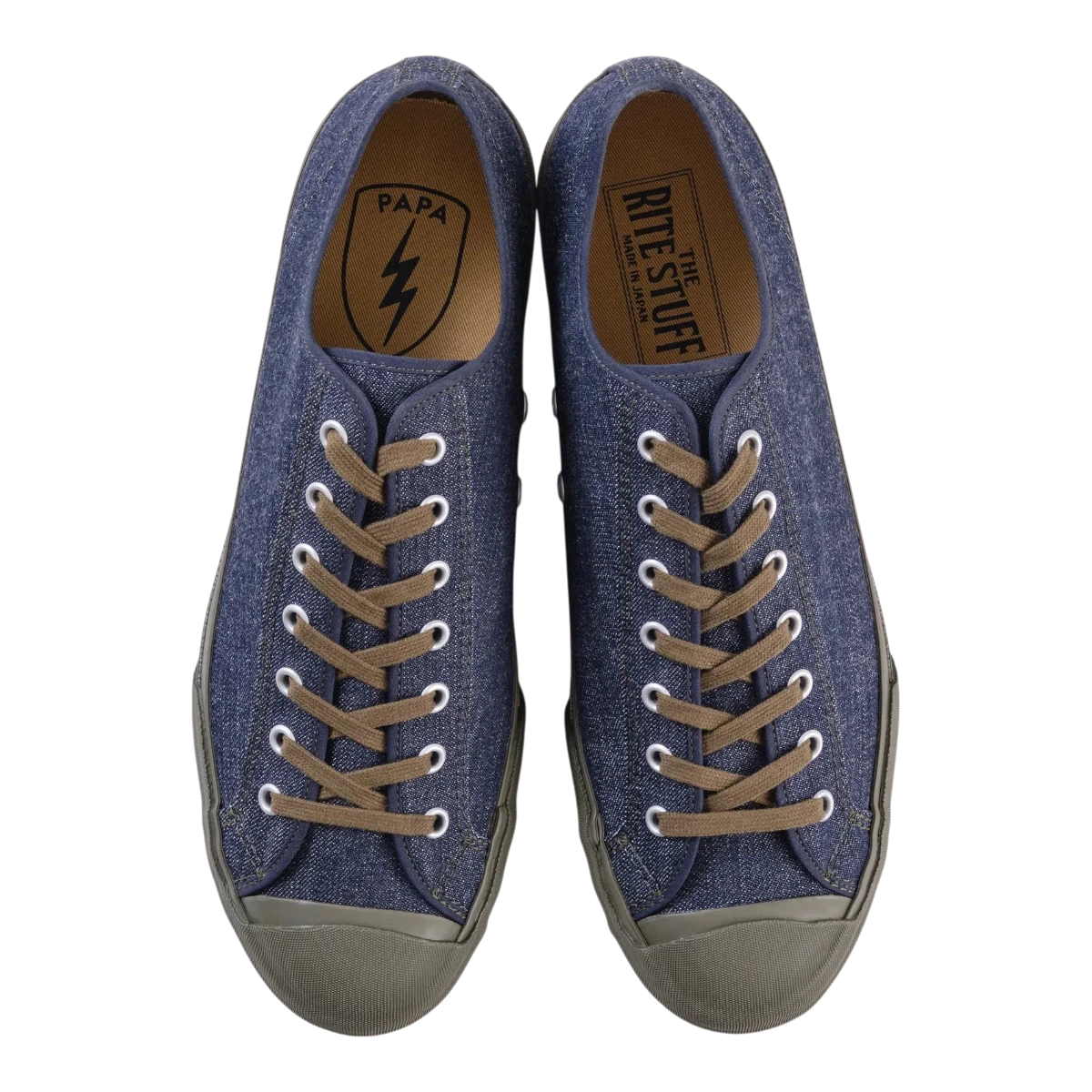 MILWORKS Amoskeag indigo denim sneakers with vulcanized rubber soles and brown laces, top-down view.