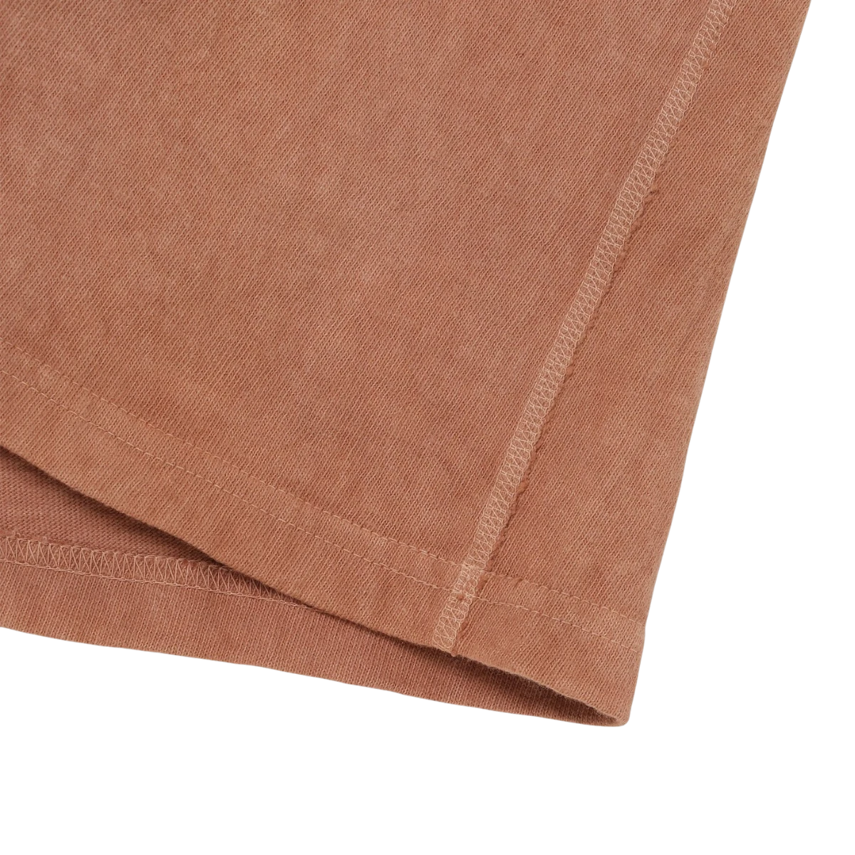 Wonder looper Amami hand-dyed rosy cotton slub t-shirt showing the textured fabric and flat side seam construction.