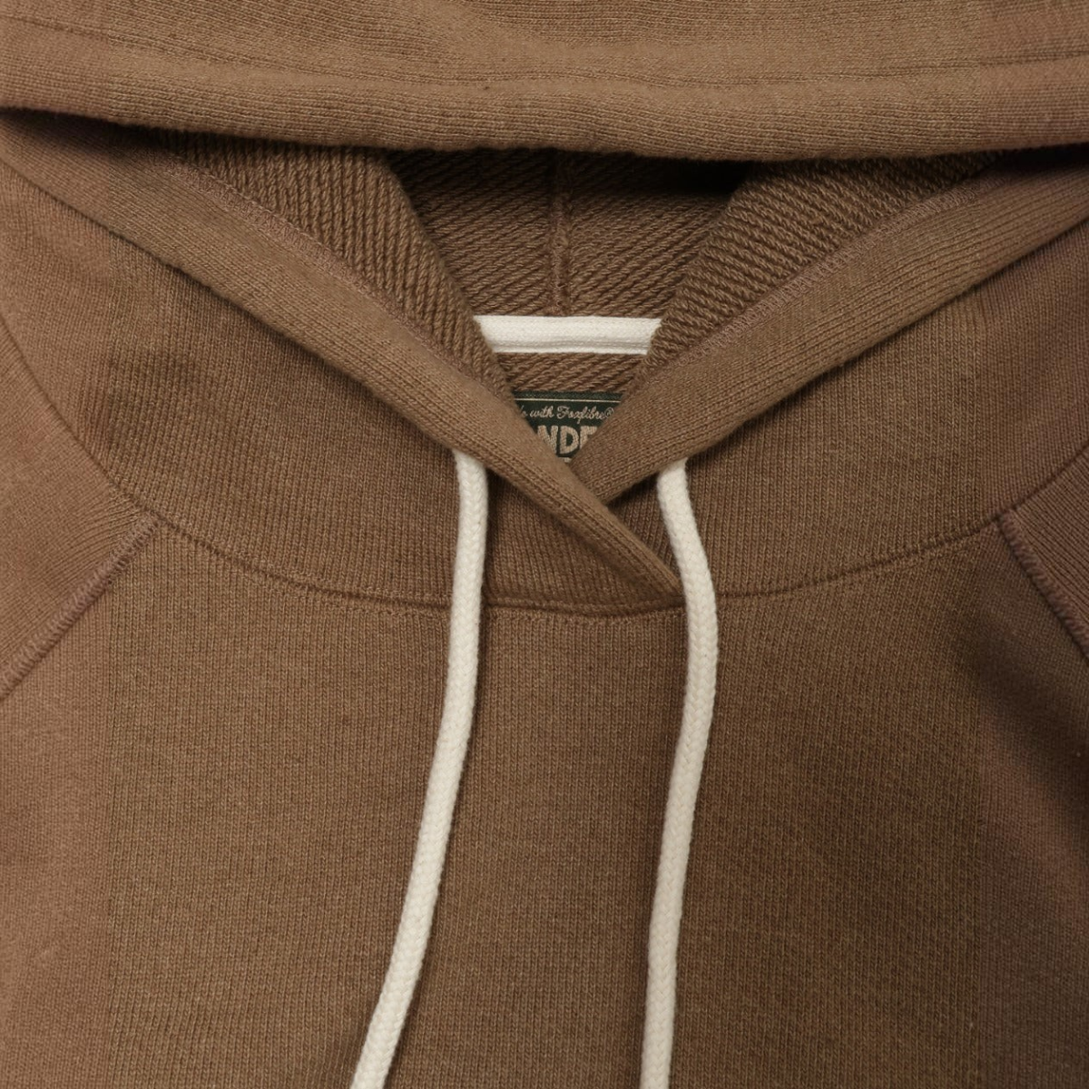 MILWORKS pullover hoodie in coyote 80 brown heavy French terry cotton with white drawstring and interior label detail