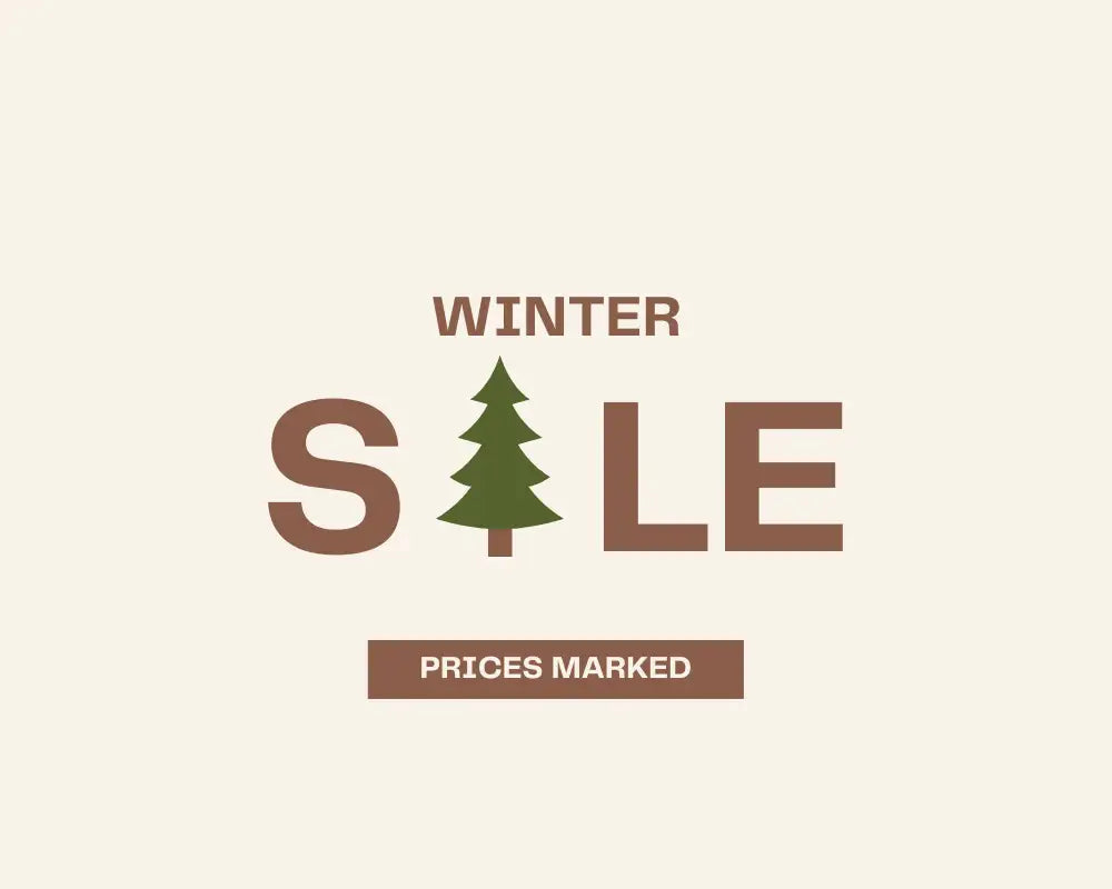 Brown ’winter sale’ logo with a green pine tree replacing the letter ’s’ and text indicating prices are marked.