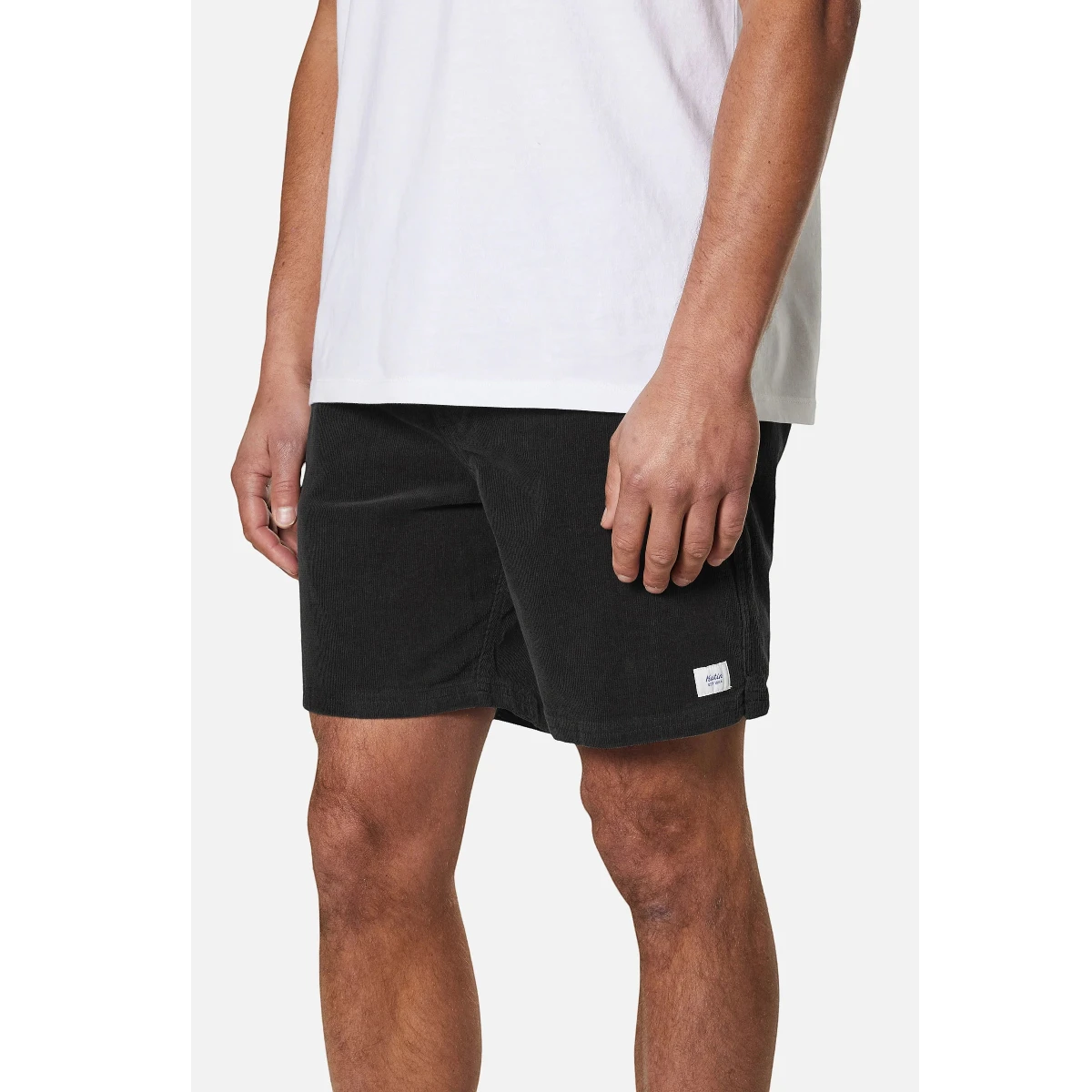 MILWORK black corduroy shorts with a white logo tag, made from 98% cotton and 2% spandex.