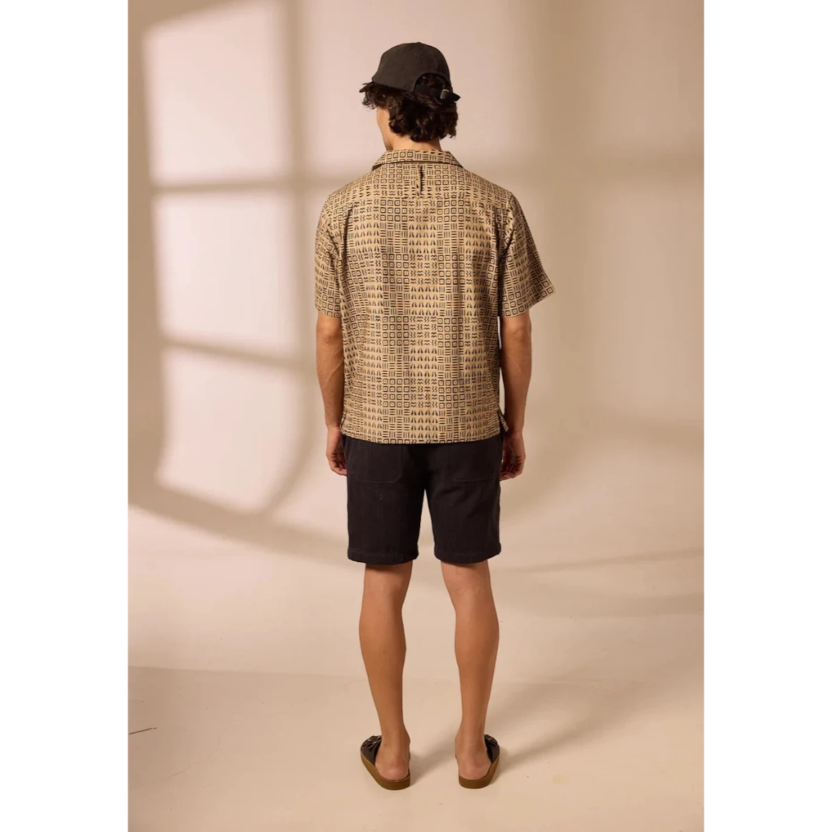 MILWORK Khushi Camp Shirt in black and tan tile block print cotton. Relaxed fit, short sleeves, spread collar.