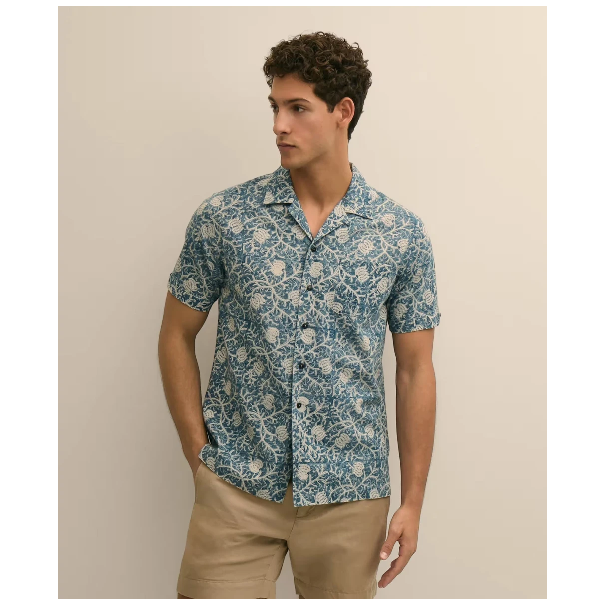 MILWORK blue and white block print 100% cotton short sleeve camp collar shirt on a man.