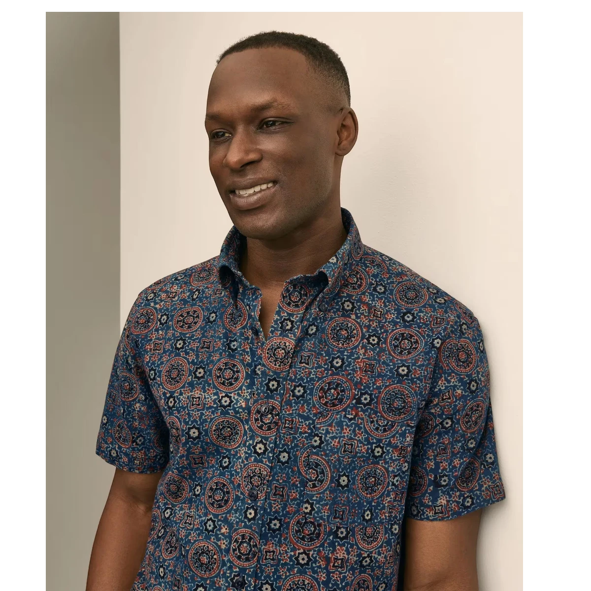 MILWORK blue cotton short sleeve shirt with a classic fit and intricate block print in spice and navy tones.
