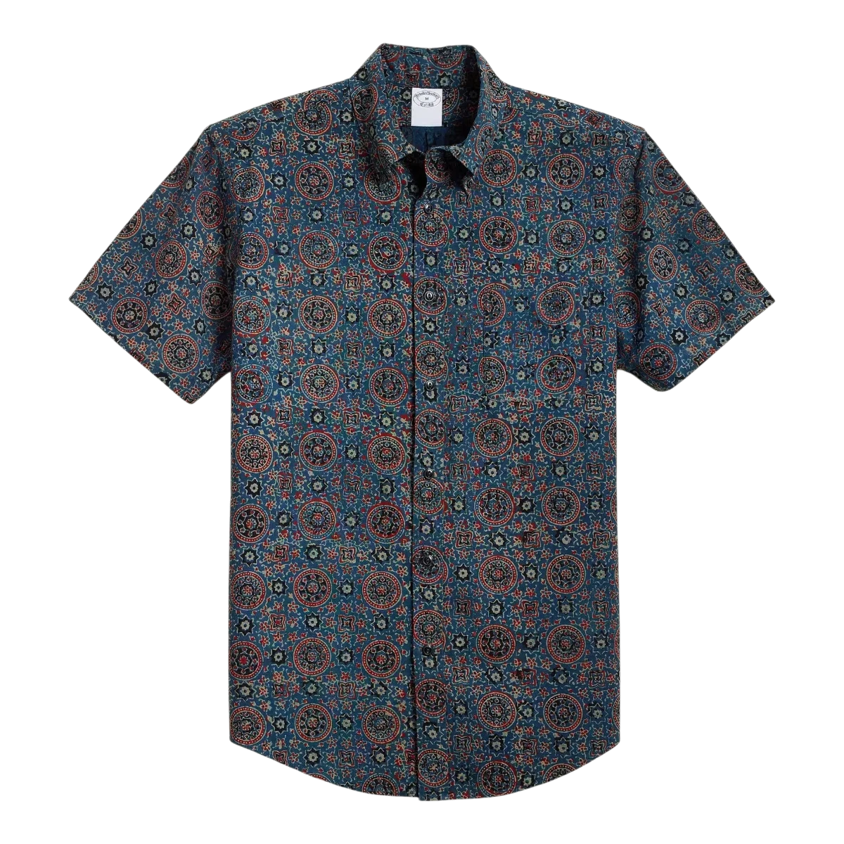 MILWORK blue cotton short sleeve shirt with a repeating circular block print in red and tan, featuring a button-down collar and chest pocket.