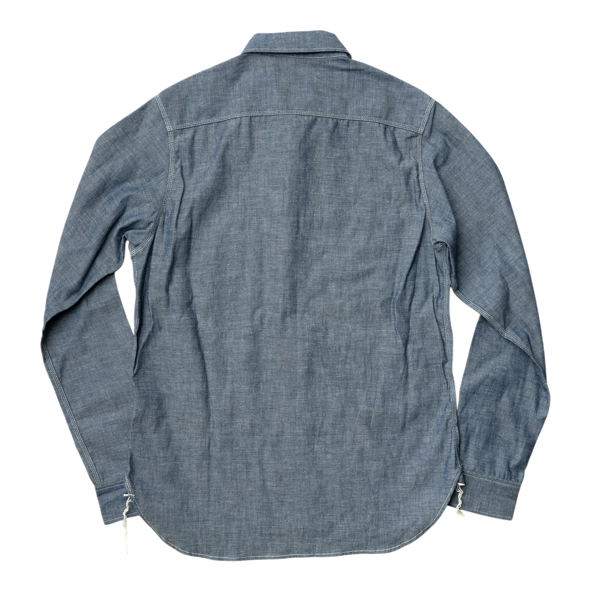 MILWORK blue selvedge chambray work shirt with triple-needle stitching and natural shell buttons.