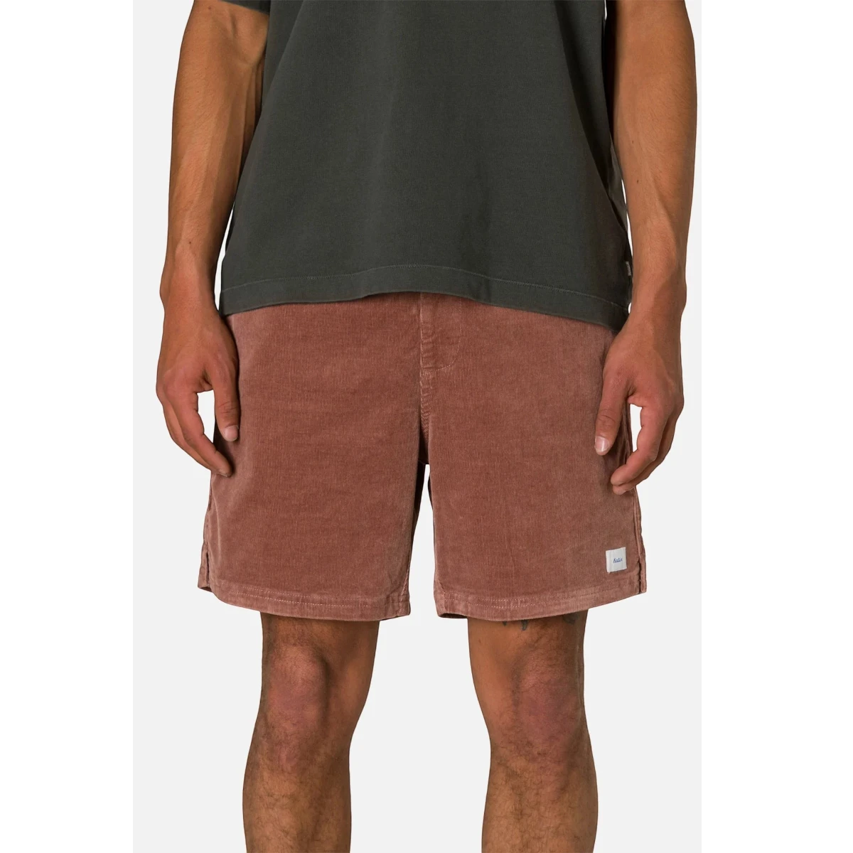 MILWORK Cord Local Short in Dark Clay. Men's 16-wale corduroy shorts with stretch, above-the-knee length, and welt pockets.