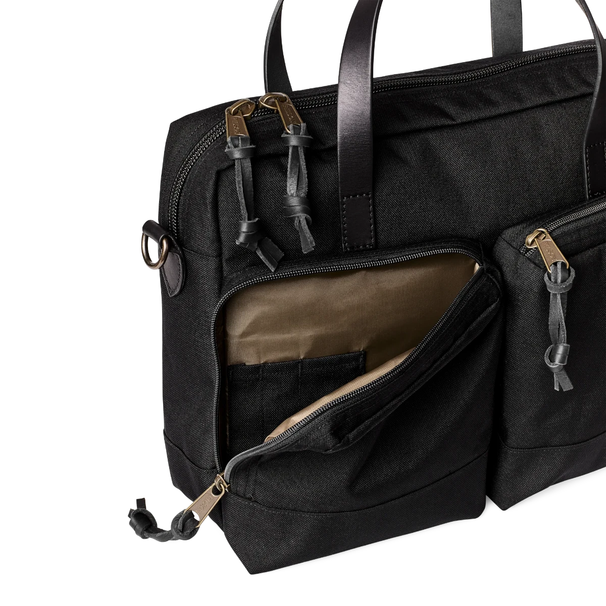 MILWORK Dryden Briefcase in black abrasion-resistant Cordura nylon with leather handles and brass zippers. Features exterior pockets.