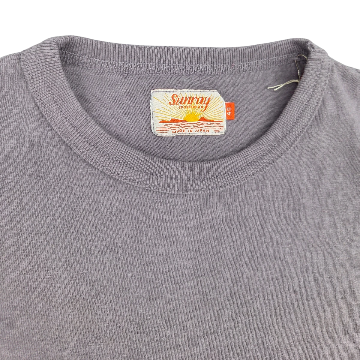 MILWORK Haleiwa Loopwheel Tee in minimal grey recycled cotton jersey. Features a crew neck and Sunray Sportswear label. Made in Japan.