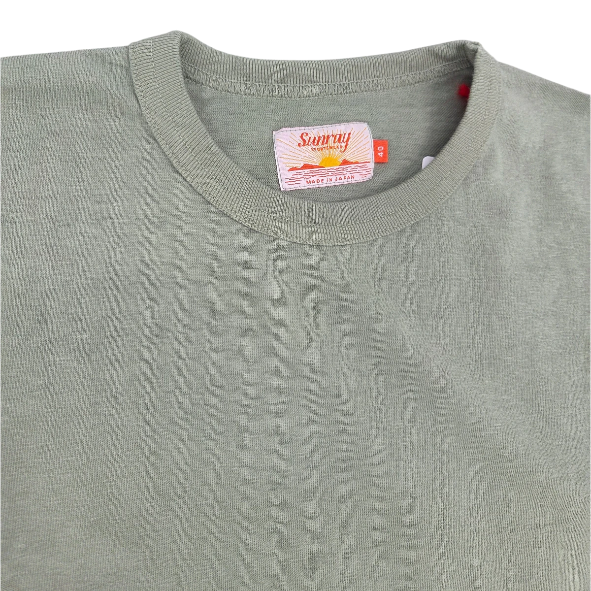 MILWORKSHaleiwa Loopwheel Tee in a sage green recycled cotton. Features a crew neck and Sunray Sportswear label made in Japan.