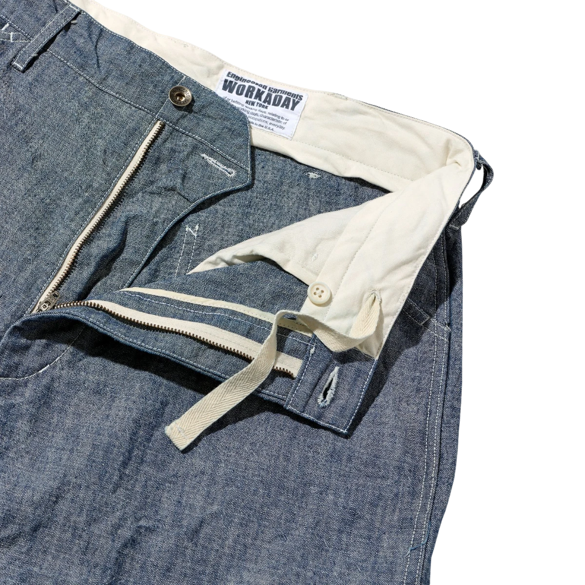 MILWORK Painter Pant Indigo 10oz Sea Canvas workwear trousers with a zip fly and button closure.