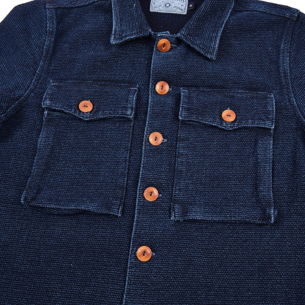 MILWORK Indigo Sashiko shirt with two chest pockets and corozo buttons. 100% cotton, single rinsed.