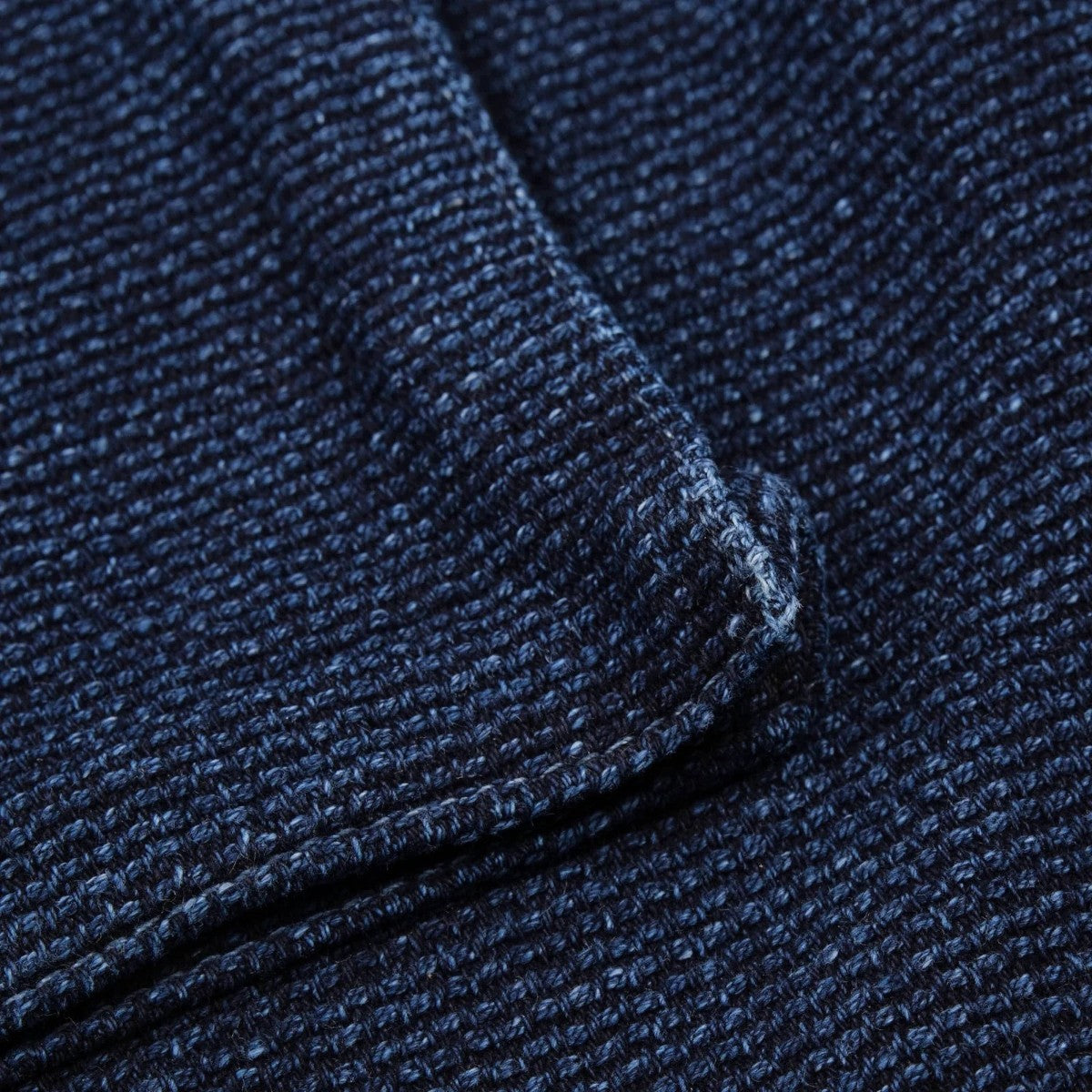 MILWORK Indigo Sashiko single rinsed 100% cotton shirt with textured weave and visible stitching.