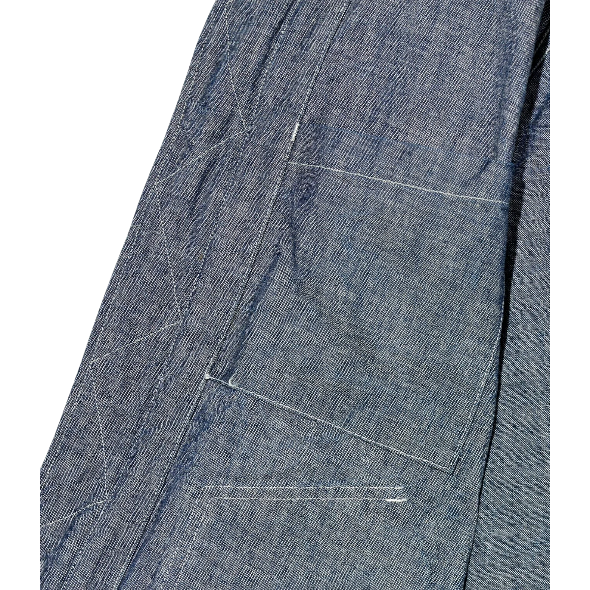 MILWORK Indigo 10oz Sea Canvas Deck Parka with white contrast stitching and two front pockets.