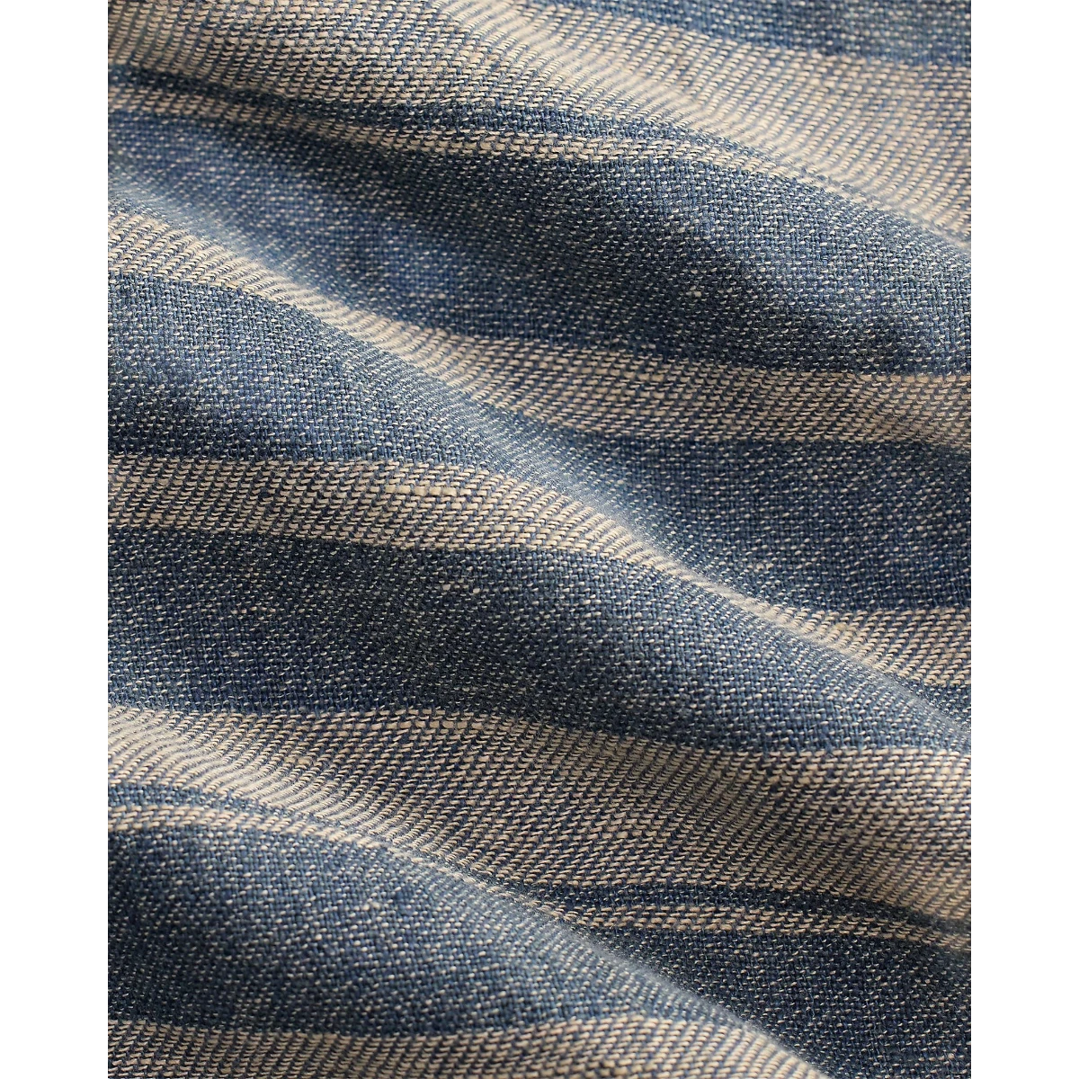 MILWORK Indigo cream striped linen dobby overshirt with a rustic texture and metal buttons.