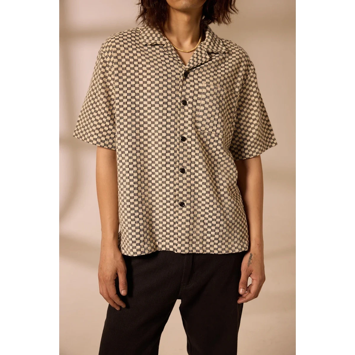 MILWORK Khushi Camp Shirt in black and white check pattern, 100% cotton with short sleeves and camp collar.