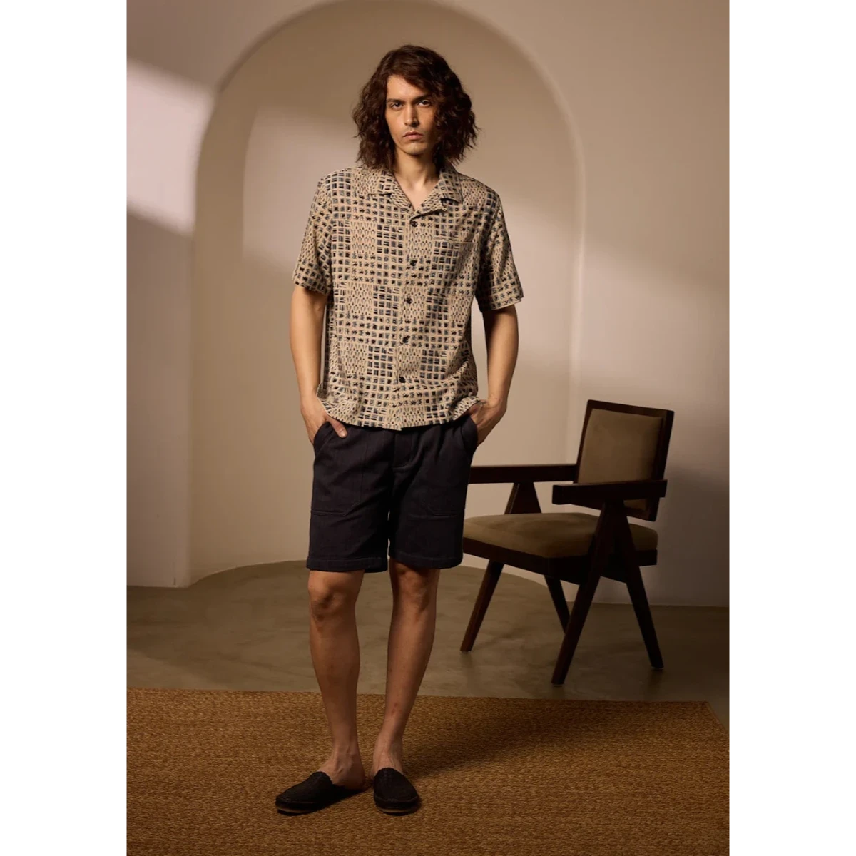 MILWORK Khushi Camp Shirt in indigo with tile block print, short sleeves, spread collar, and chest pocket. Relaxed fit, 100% cotton.