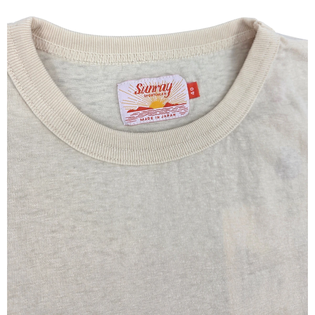 MILWORK Haleiwa Loopwheel Tee in a light cream recycled cotton. Features a Sunray Sportswear label and a strong neckline.