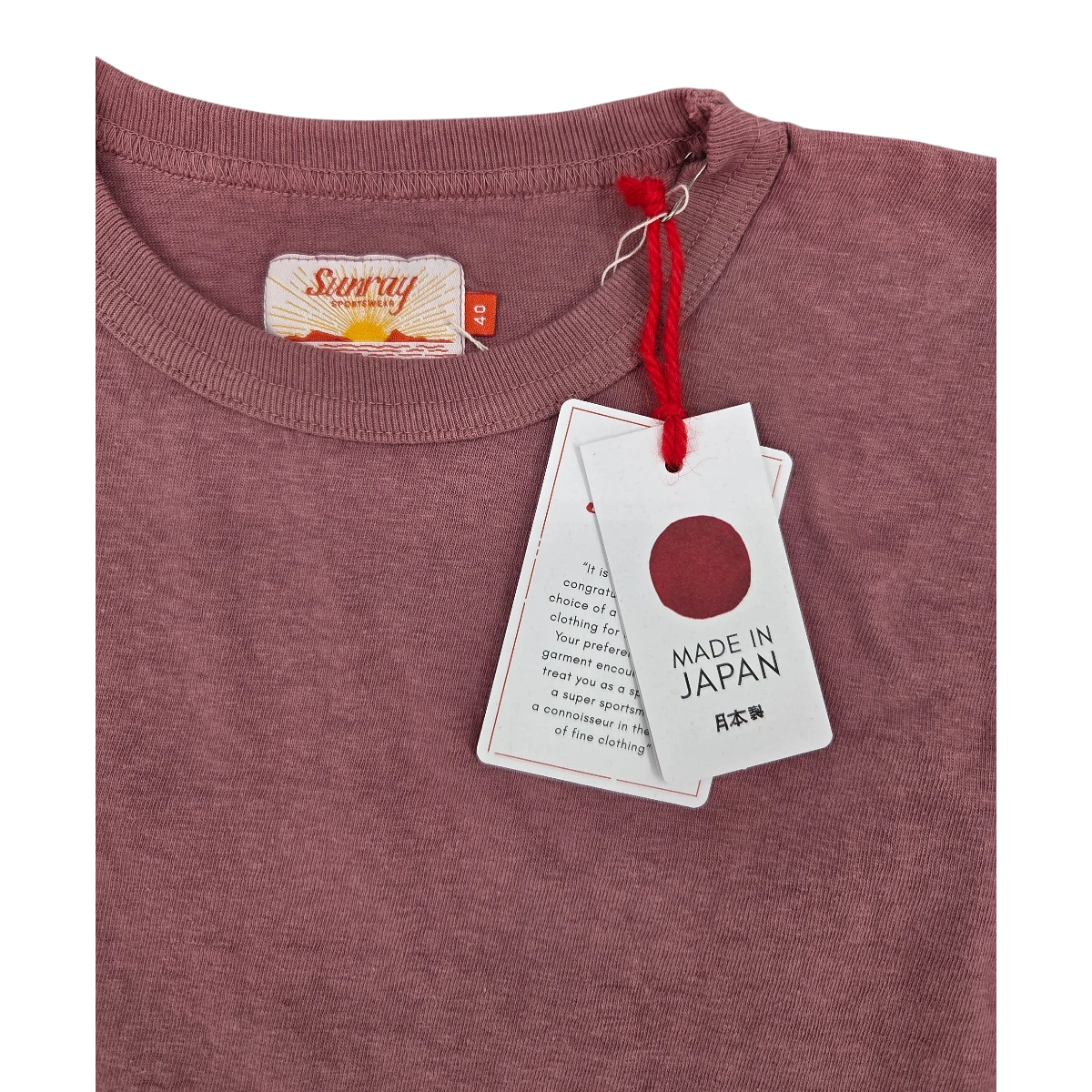 MILWORK Haleiwa Loopwheel Tee in wistful mauve recycled cotton. Features a Sunray Sportswear label and 'Made in Japan' tag.