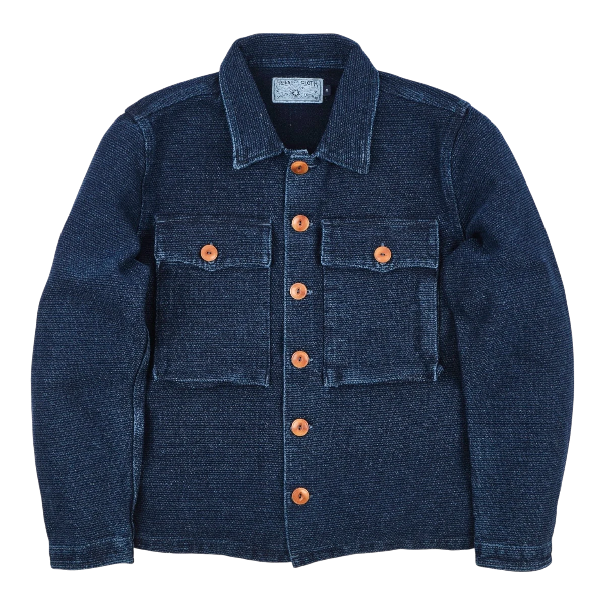 MILWORK Midway Indigo Sashiko Single Rinsed cotton jacket with two chest pockets and corozo buttons.