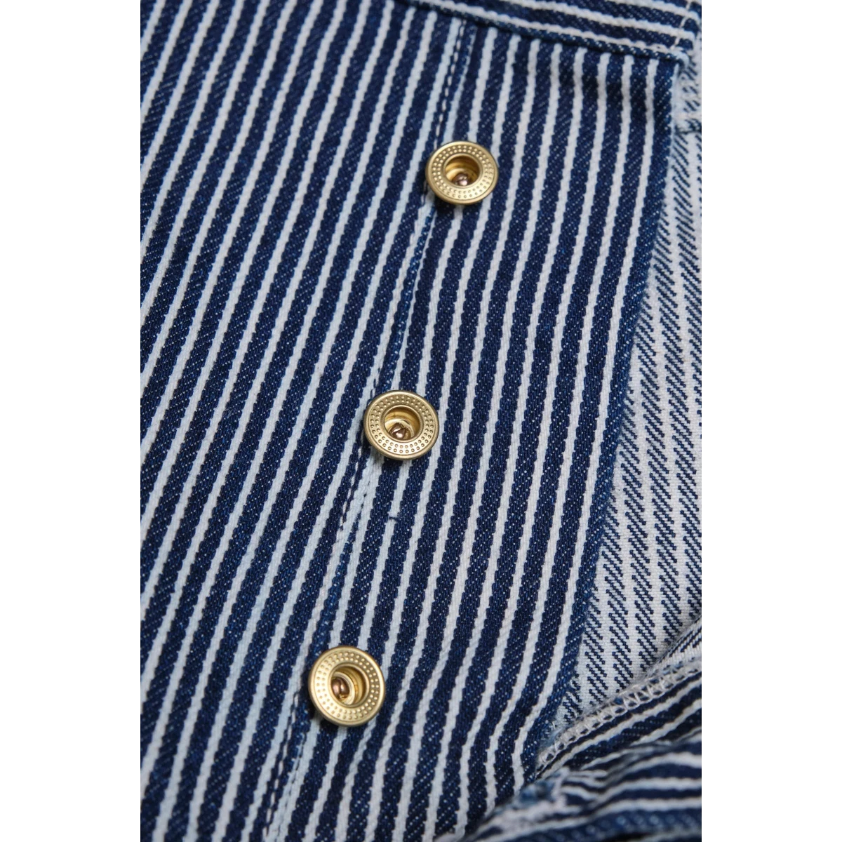 MILWORK Ortega Pant in hickory stripe blue and white cotton with gold button closure and reinforced stitching.