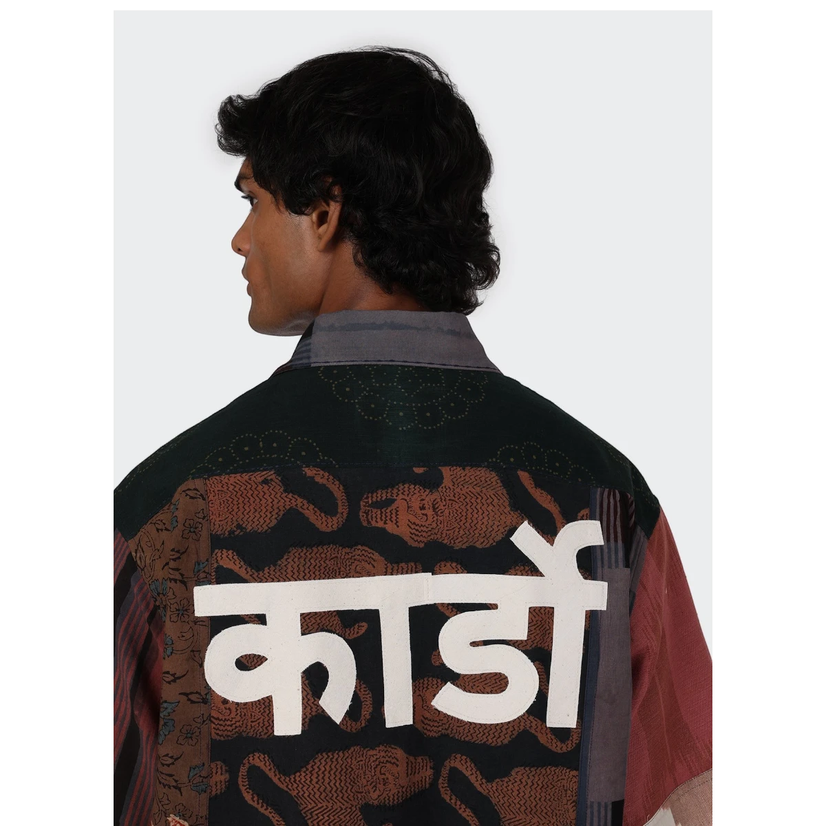 MILWORK Yuto 12 panel patchwork shirt with oversized fit, featuring a graphic print of tigers and white text on a dark background, made of 100% cotton.