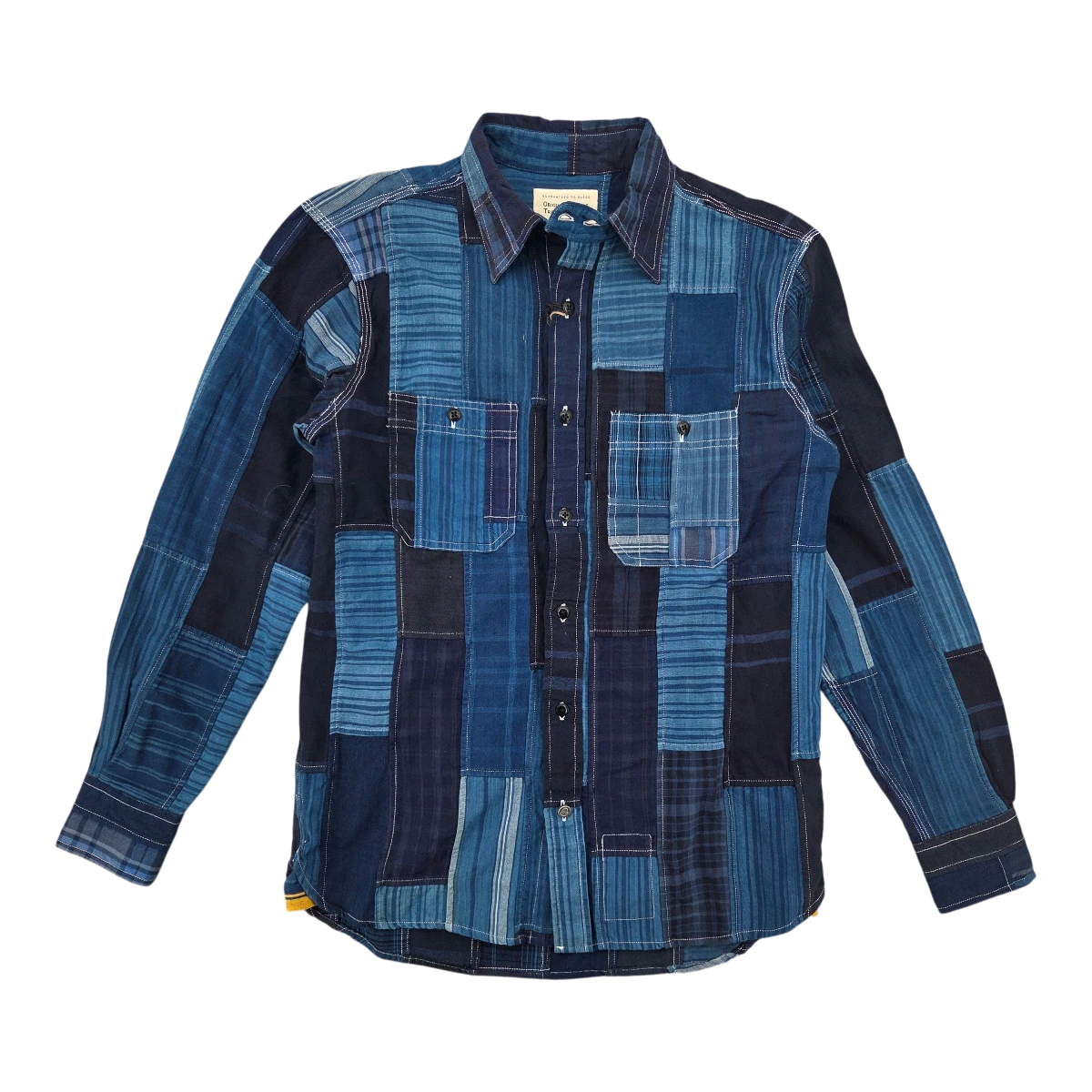 MILWORK indigo blue patchwork cotton utility shirt with two chest pockets and button-down closure.