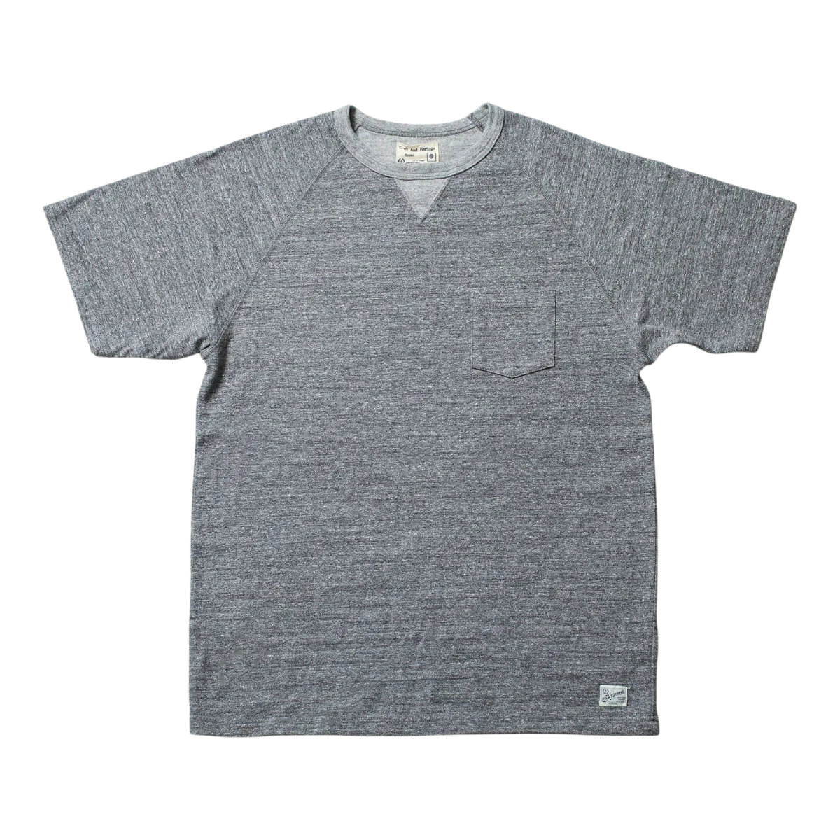 MILWORK Raffia Cotton Gusset T-Shirt in gray, featuring a chest pocket and raglan sleeves. Made in Japan.