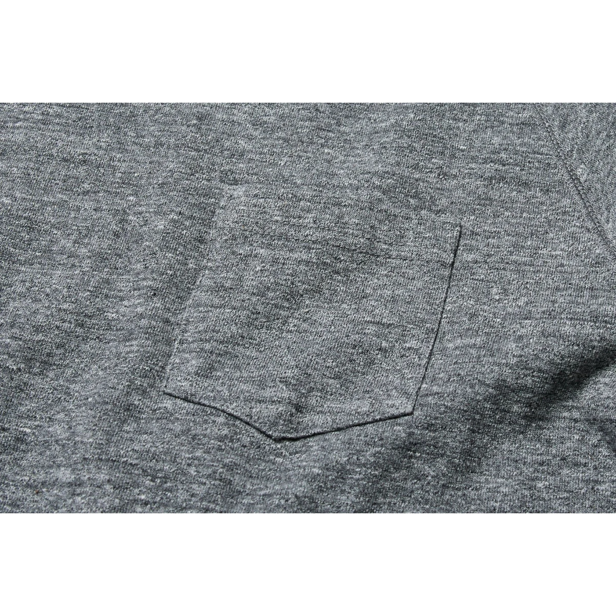 MILWORK Raffia Cotton Gusset T-Shirt in gray, featuring a chest pocket and a soft, fluffy jersey knit.