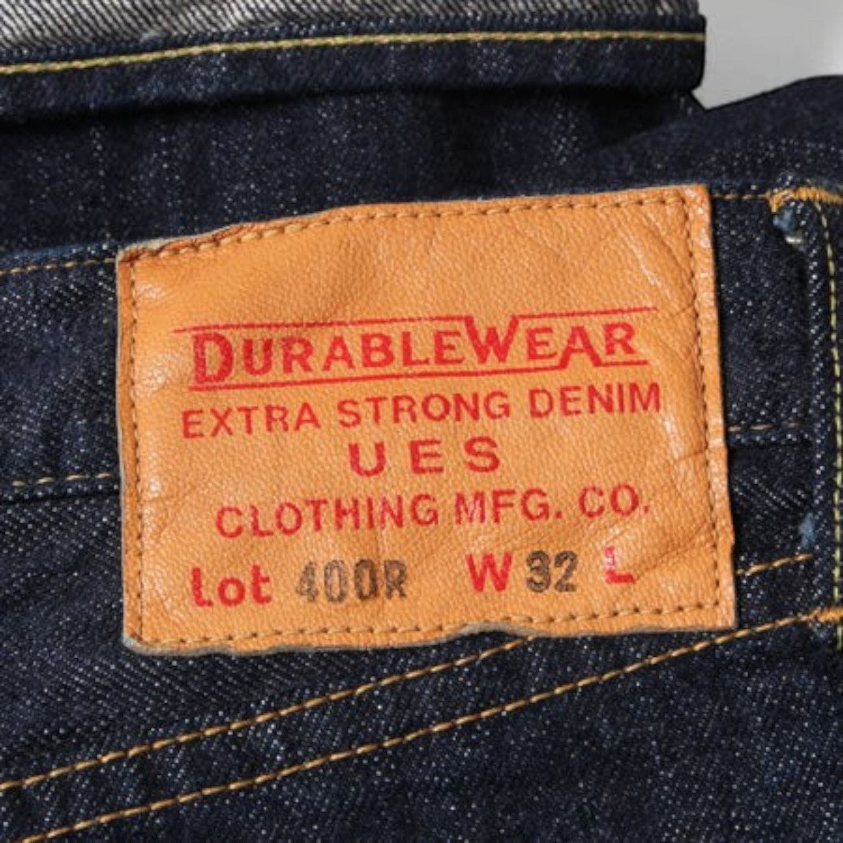 MILWORK Regular Straight Denim Once Wash Selvedge jeans, dark indigo, cotton, with leather patch detail.