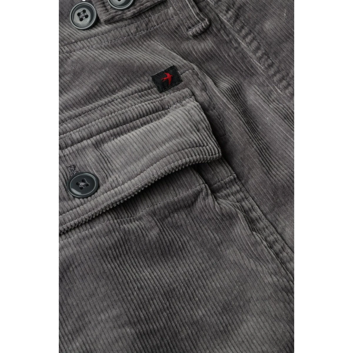 MILWORK Relwen Cord Short 7.5" in Rhino Grey. Features a button-flap cargo pocket and textured corduroy fabric.