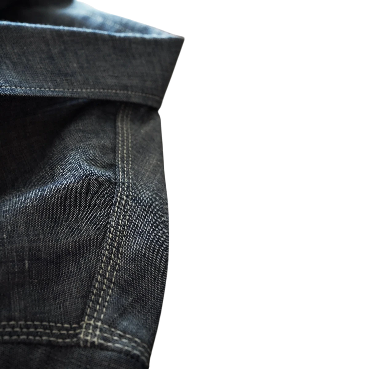 MILWORK Selvedge Chambray Work Shirt in indigo blue, featuring triple-needle stitching and a textured weave.