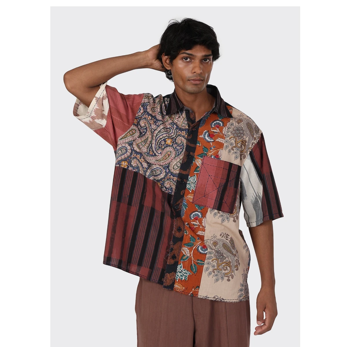 MILWORK Yuto 12 panel patchwork shirt in oversized fit, featuring natural dyed cotton with paisley and floral prints, raw edge details.