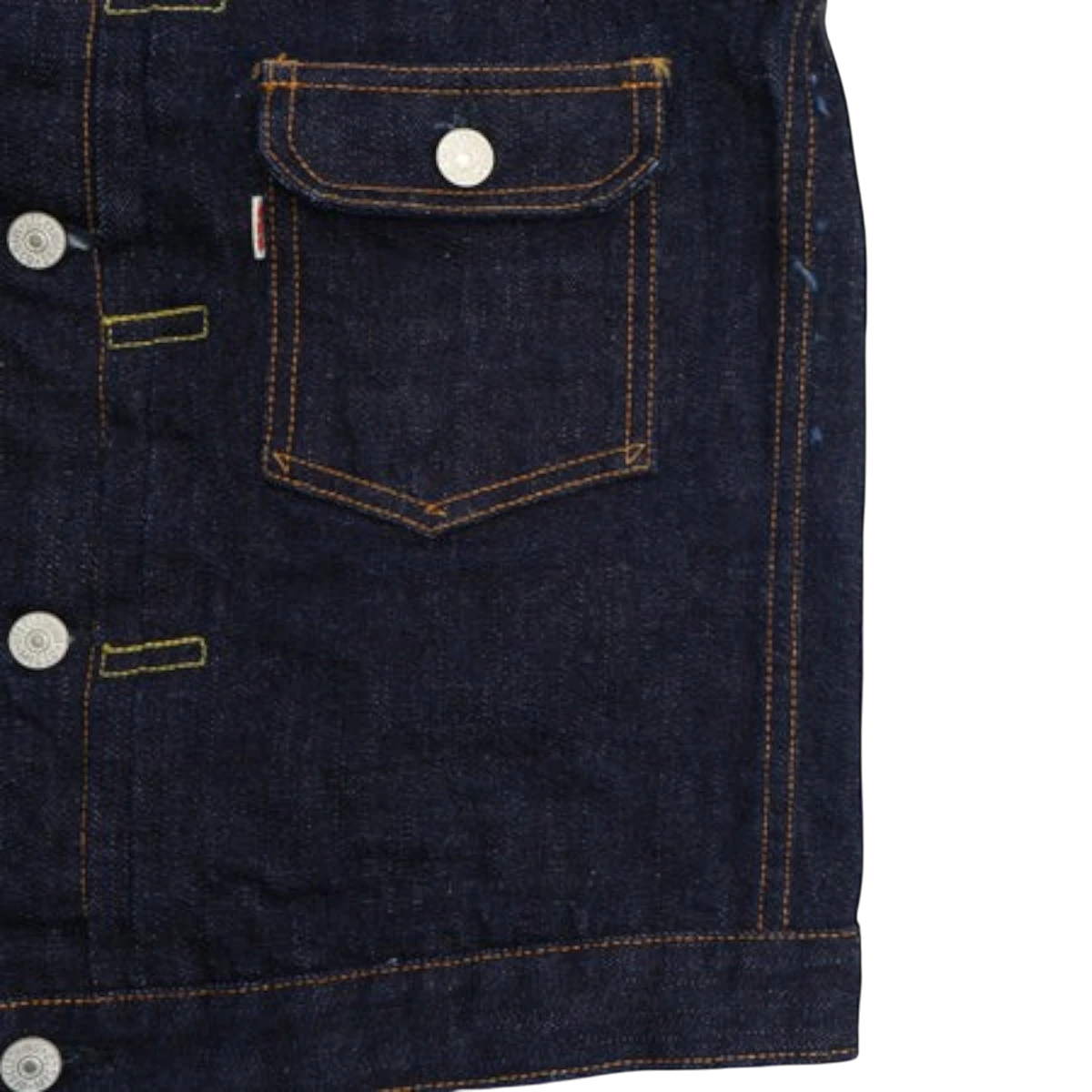 MILWORKS 17oz indigo denim jacket with a single chest pocket, metal buttons, and contrast stitching.