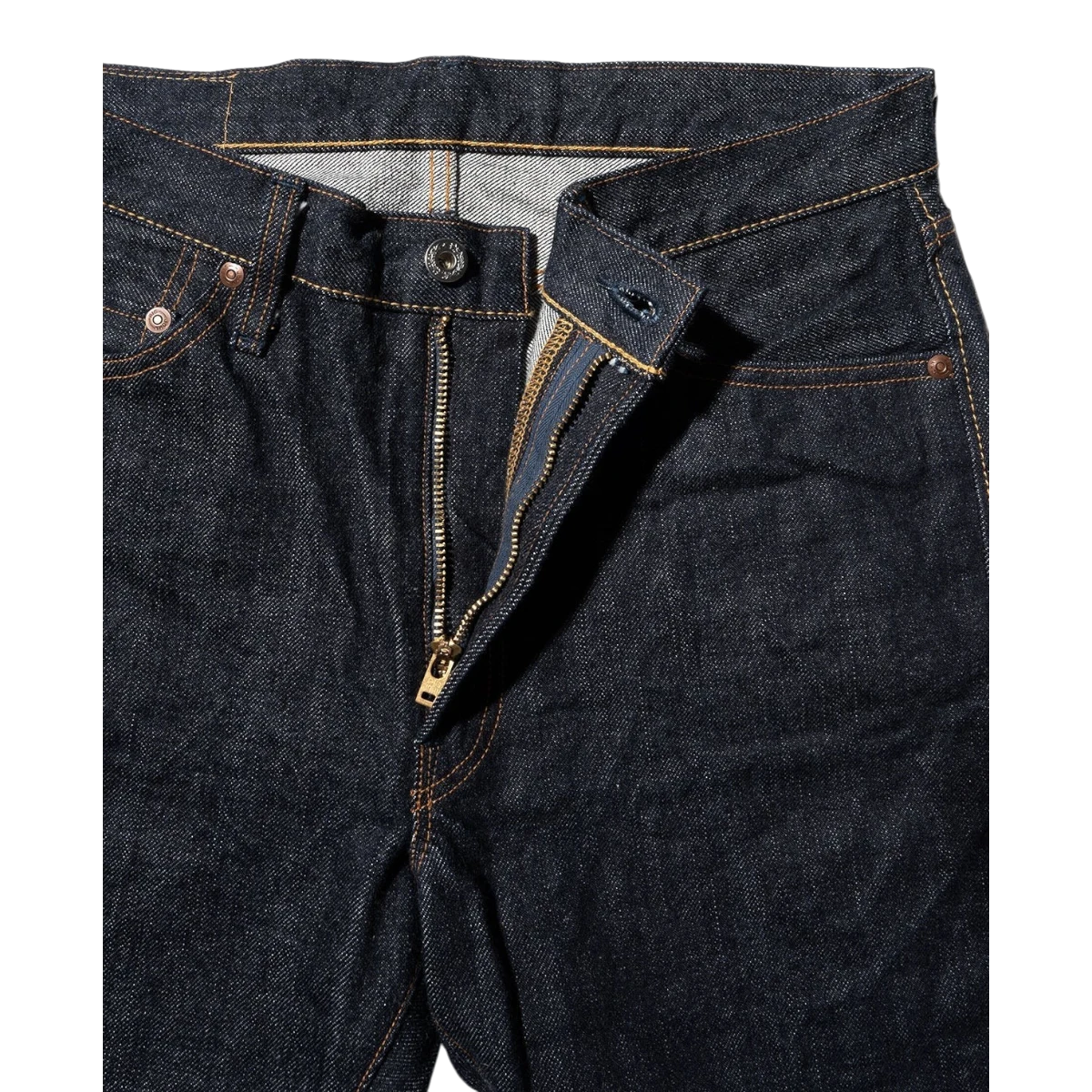 MILWORKS 17oz dark indigo selvedge denim slim fit jeans with zip fly and copper rivets.