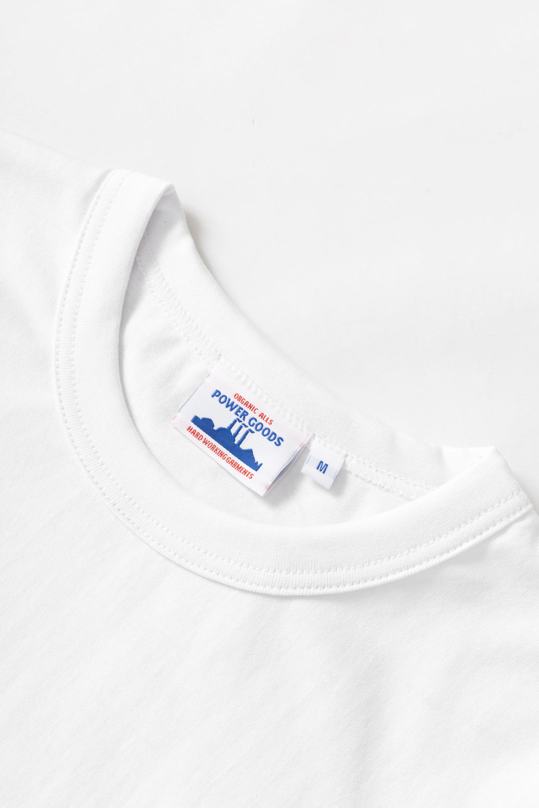 MILWORKS white organic cotton t-shirt featuring a vintage inspired neckline and branded inner neck label.