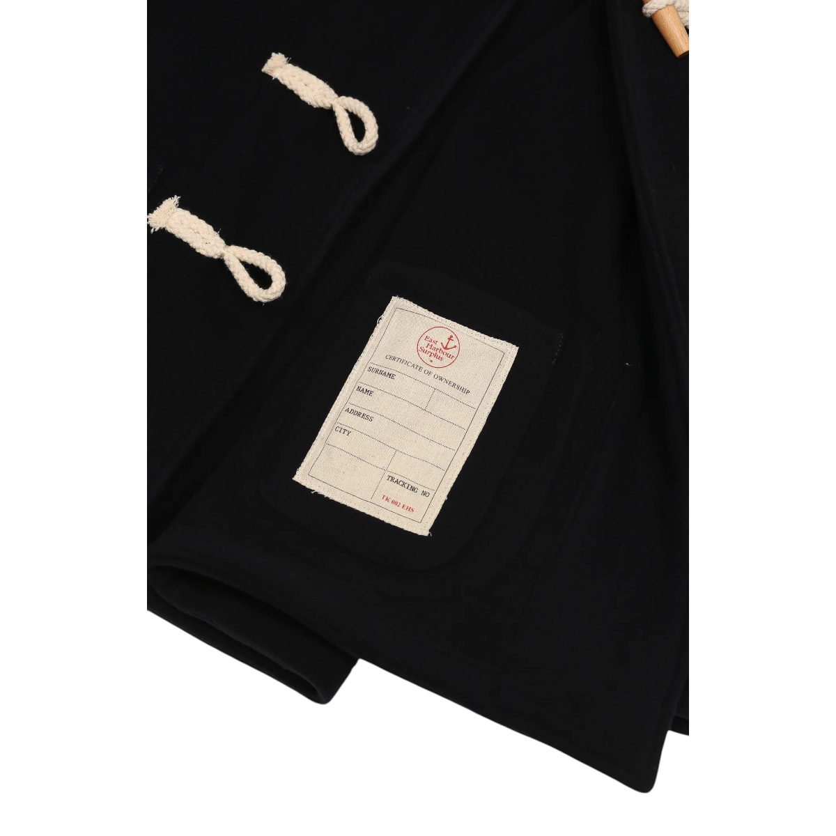 MILWORKS Ashland Montgomery coat in navy wool melton featuring an interior certificate of ownership label and toggles