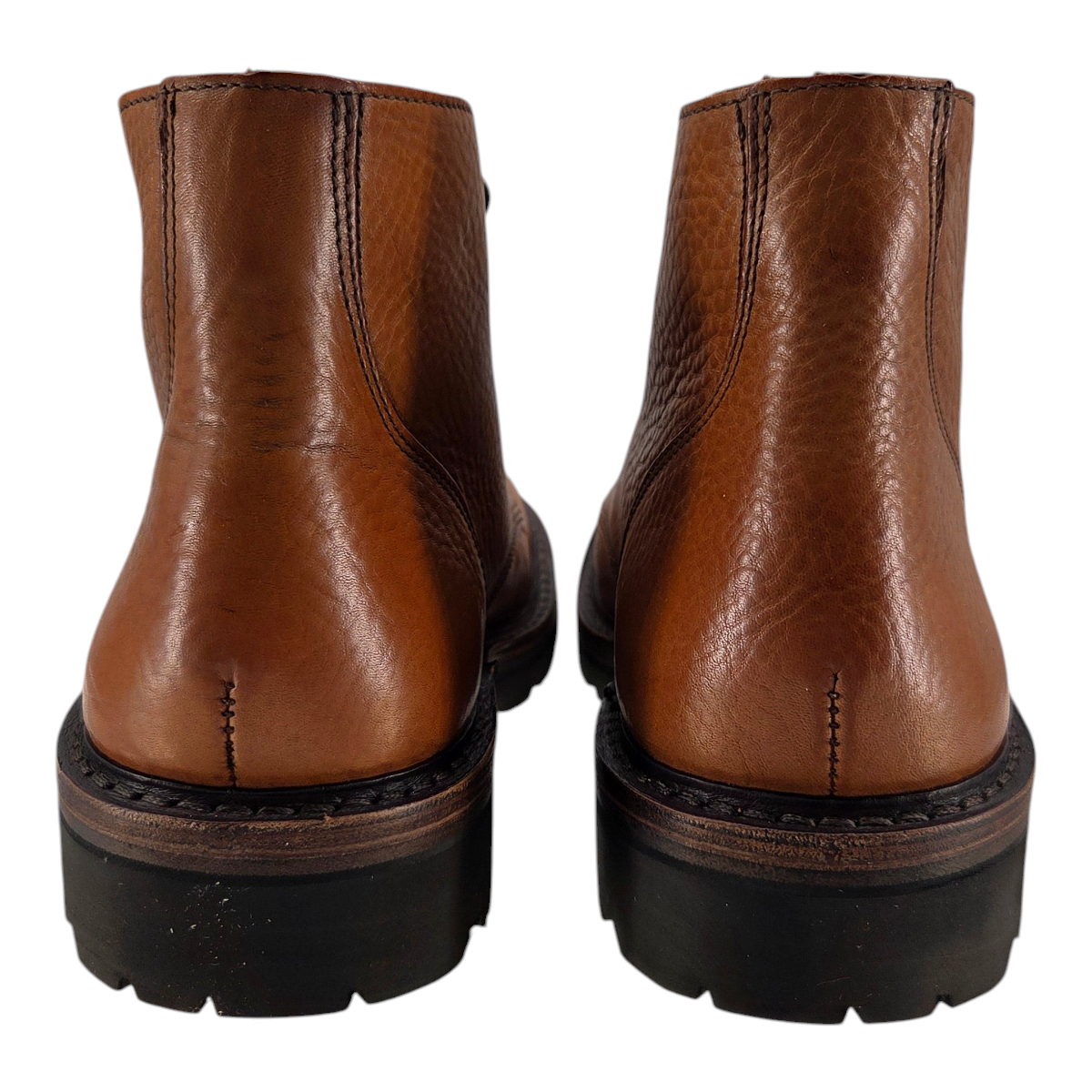 MILWORKS Astorflex Primeflex moc toe boots in nocciola tan leather with a rugged black Vibram sole, rear view.