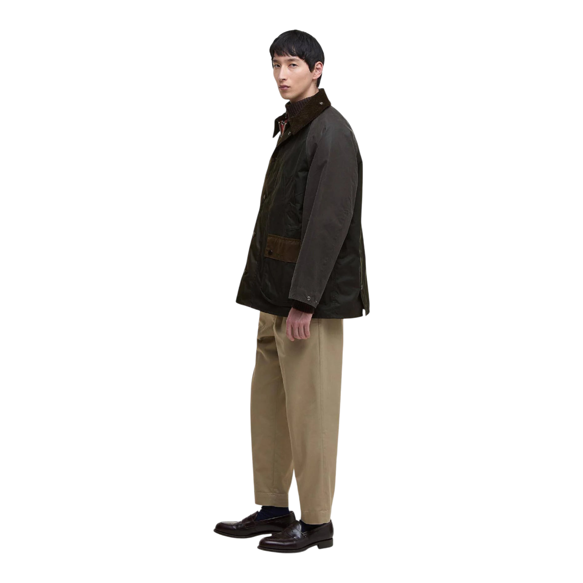 MILWORKS Barbour Patchwork Oversized Bedale Waxed Jacket in olive green with cord collar, worn by a male model.