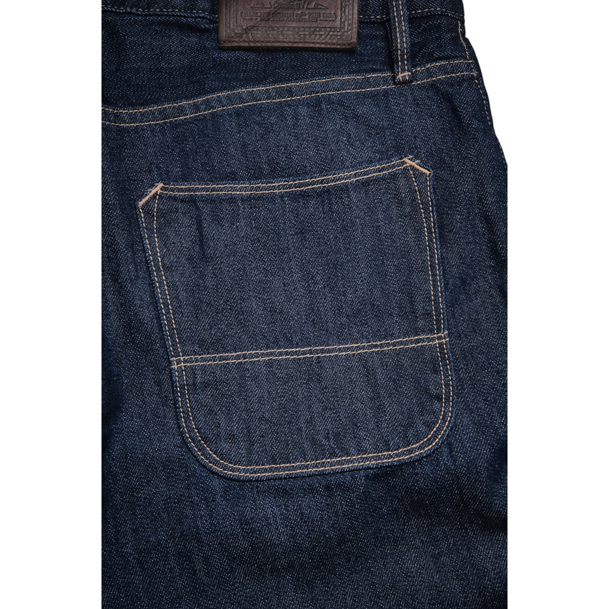 MILWORKS Belford straight leg jeans in rinsed Memphis blue selvedge denim with reinforced back pocket and leather patch
