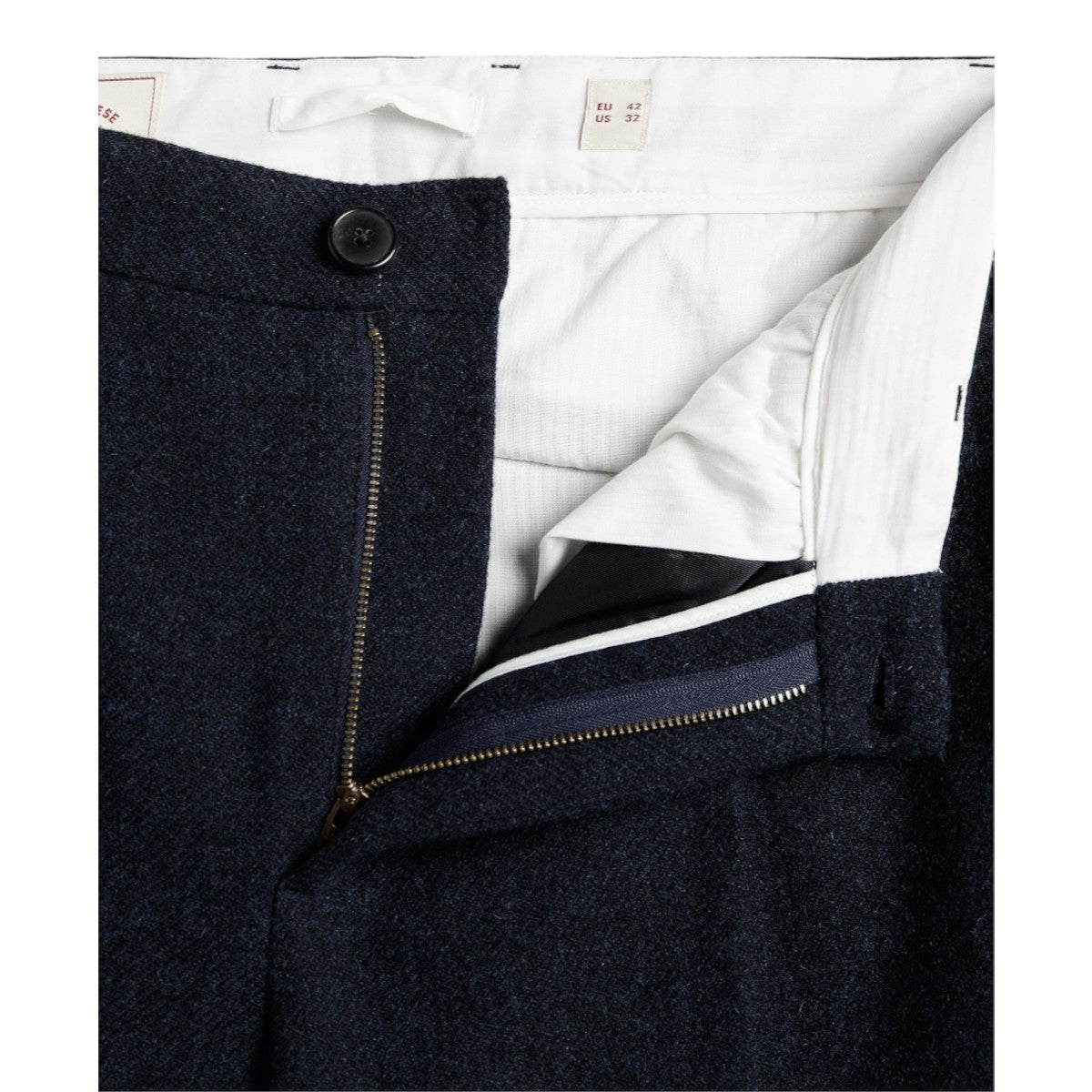 MILWORKS blue virgin wool single pleat trousers featuring a metal zipper fly and recycled polyester button closure