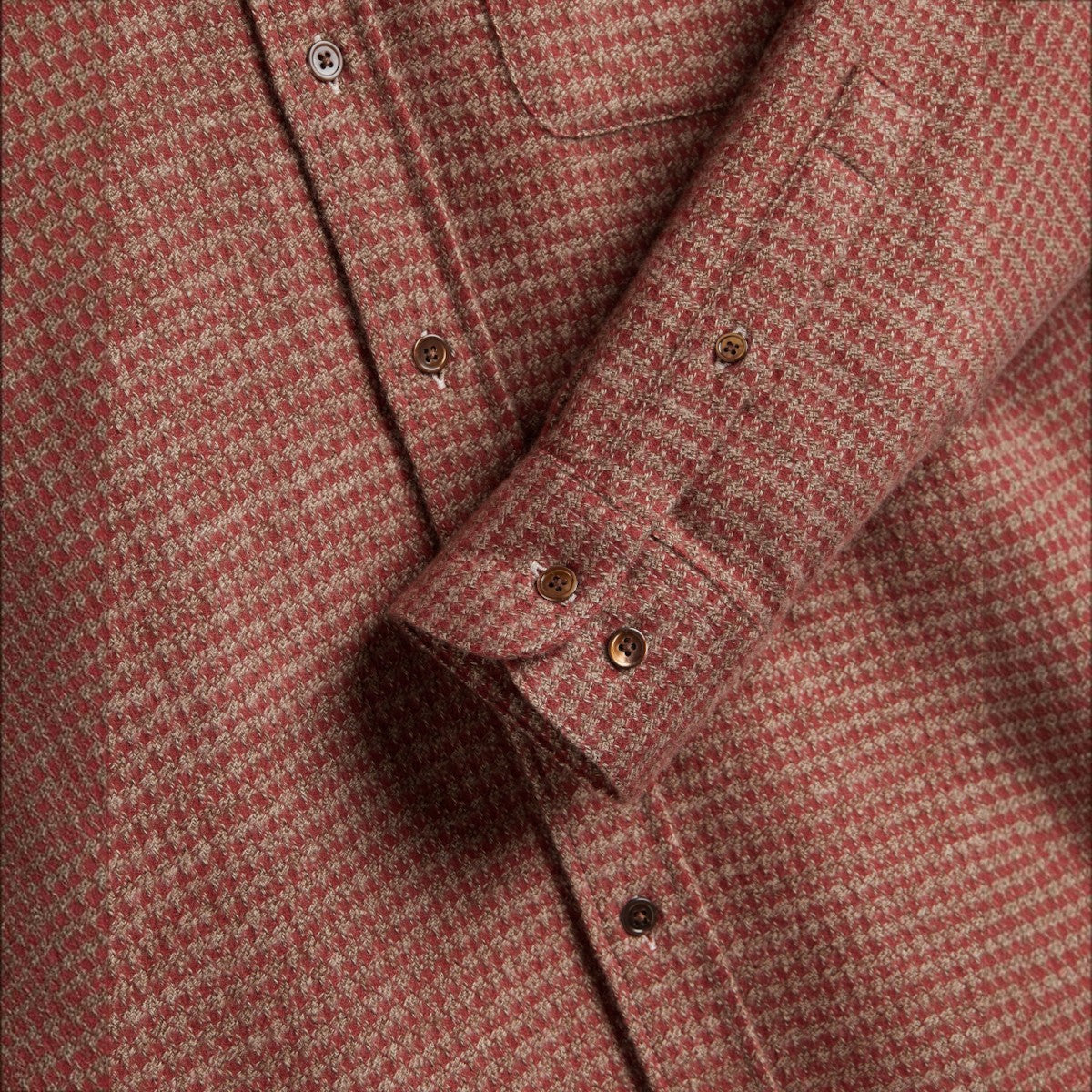 MILWORKS Portuguese Flannel shirt in clay red with a houndstooth pattern, featuring mother of pearl buttons.