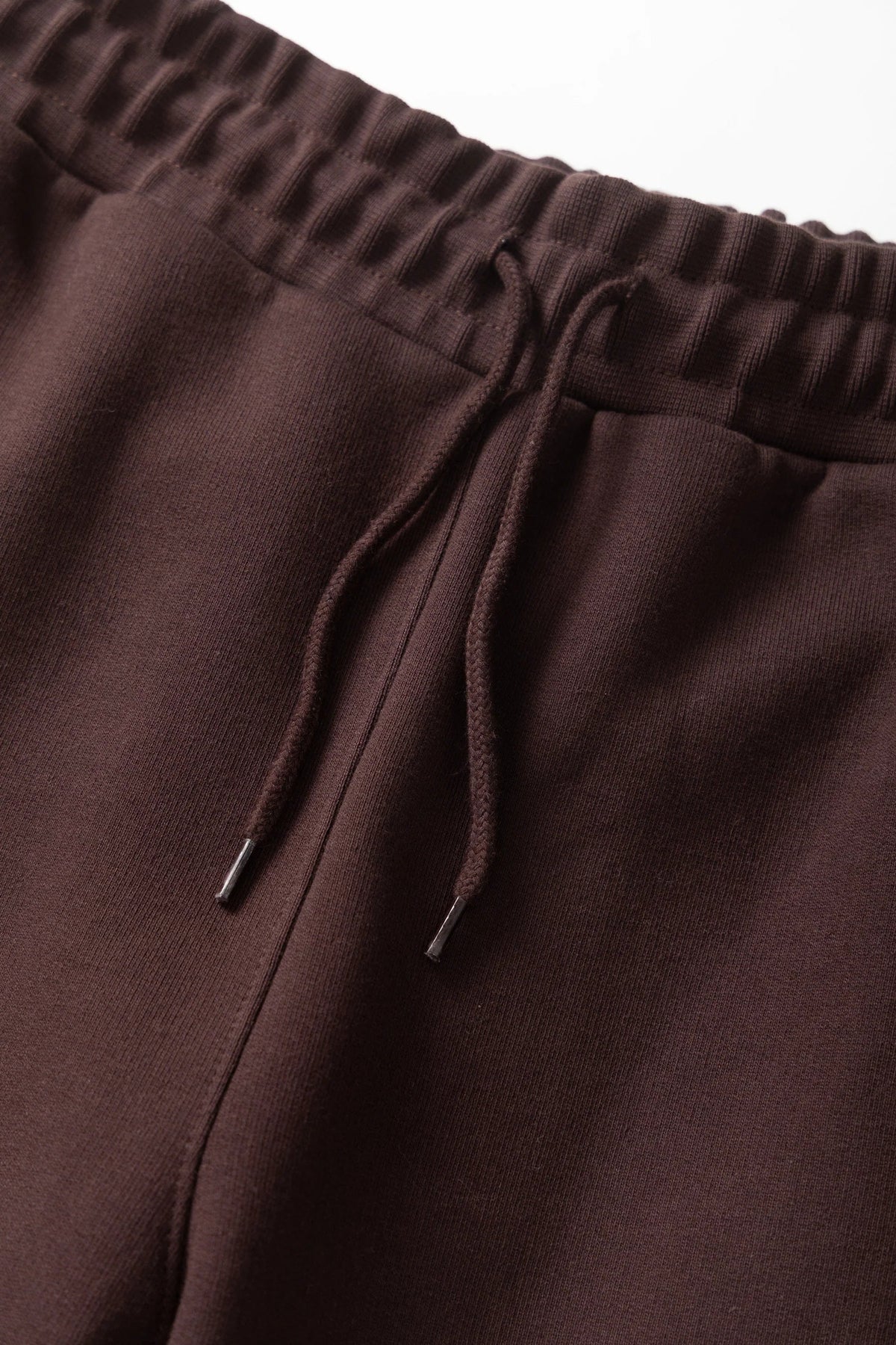 MILWORKS coffee brown 16oz organic cotton heavyweight sweatpants featuring an elastic waistband and drawcord detail.