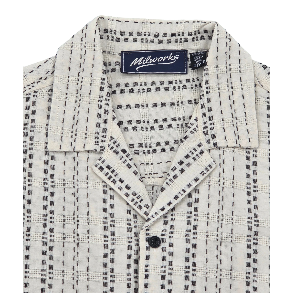 MILWORKS cream cotton woven camp shirt with a black checkered pattern and camp collar.