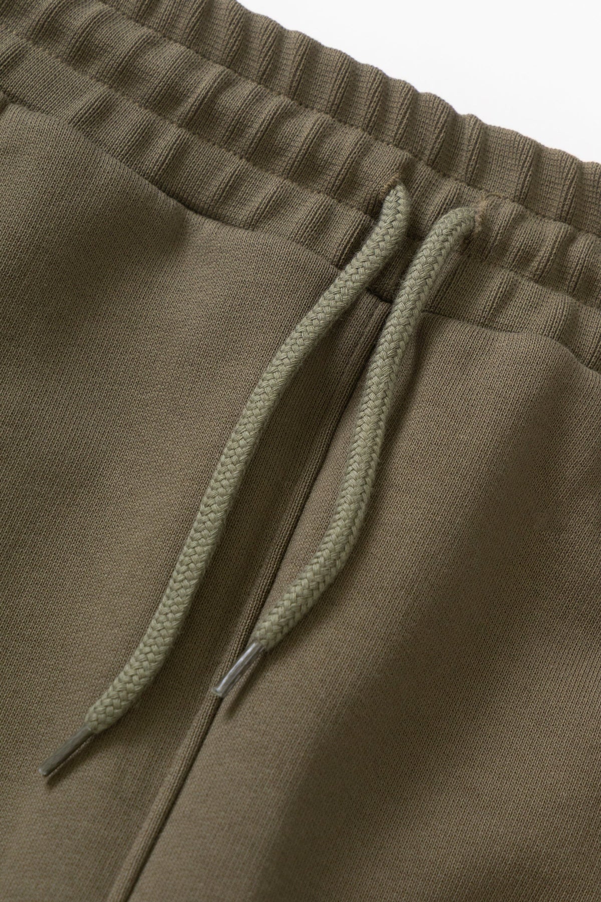 MILWORKS dark olive 16oz organic cotton heavyweight sweatpants featuring an elastic waistband and matching drawcord.