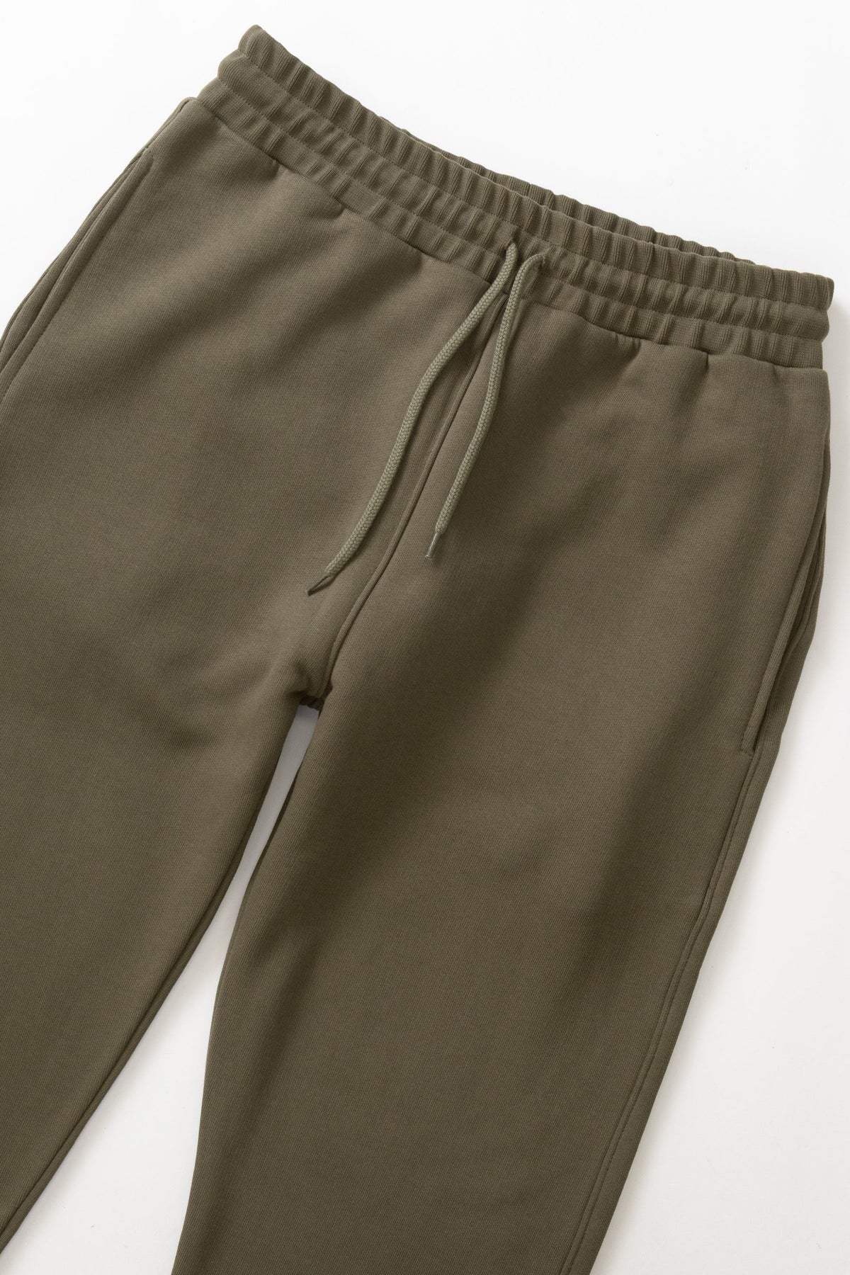 MILWORKS dark olive 16oz heavyweight organic cotton sweatpants with an elastic waistband and adjustable drawcord.