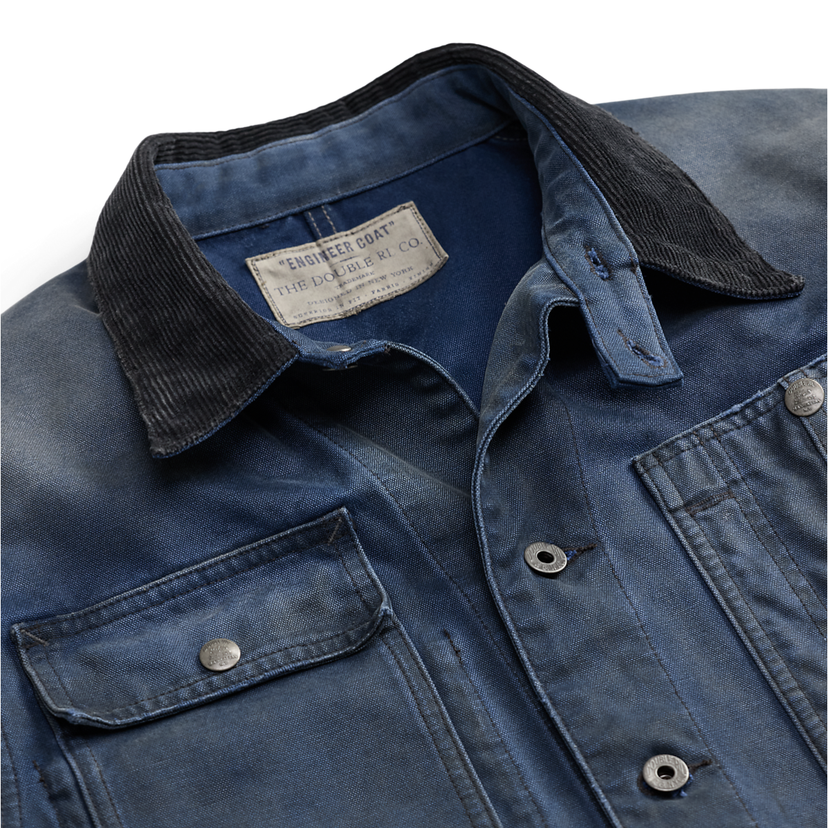 MILWORKS faded navy cotton canvas engineer jacket with a black corduroy collar and vintage metal button details.
